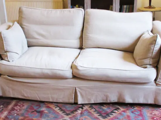 Two identical large 2 seat sofas