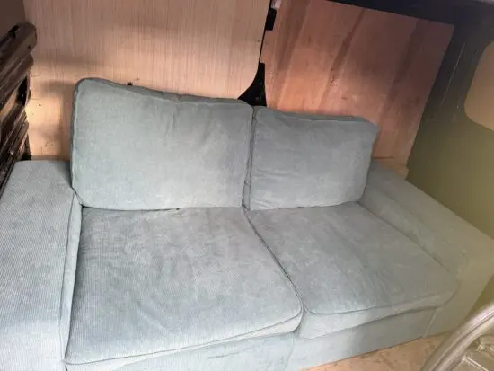 Green 2 seater sofa