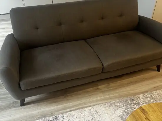 Grey fabric two seater sofa and matching arm chair