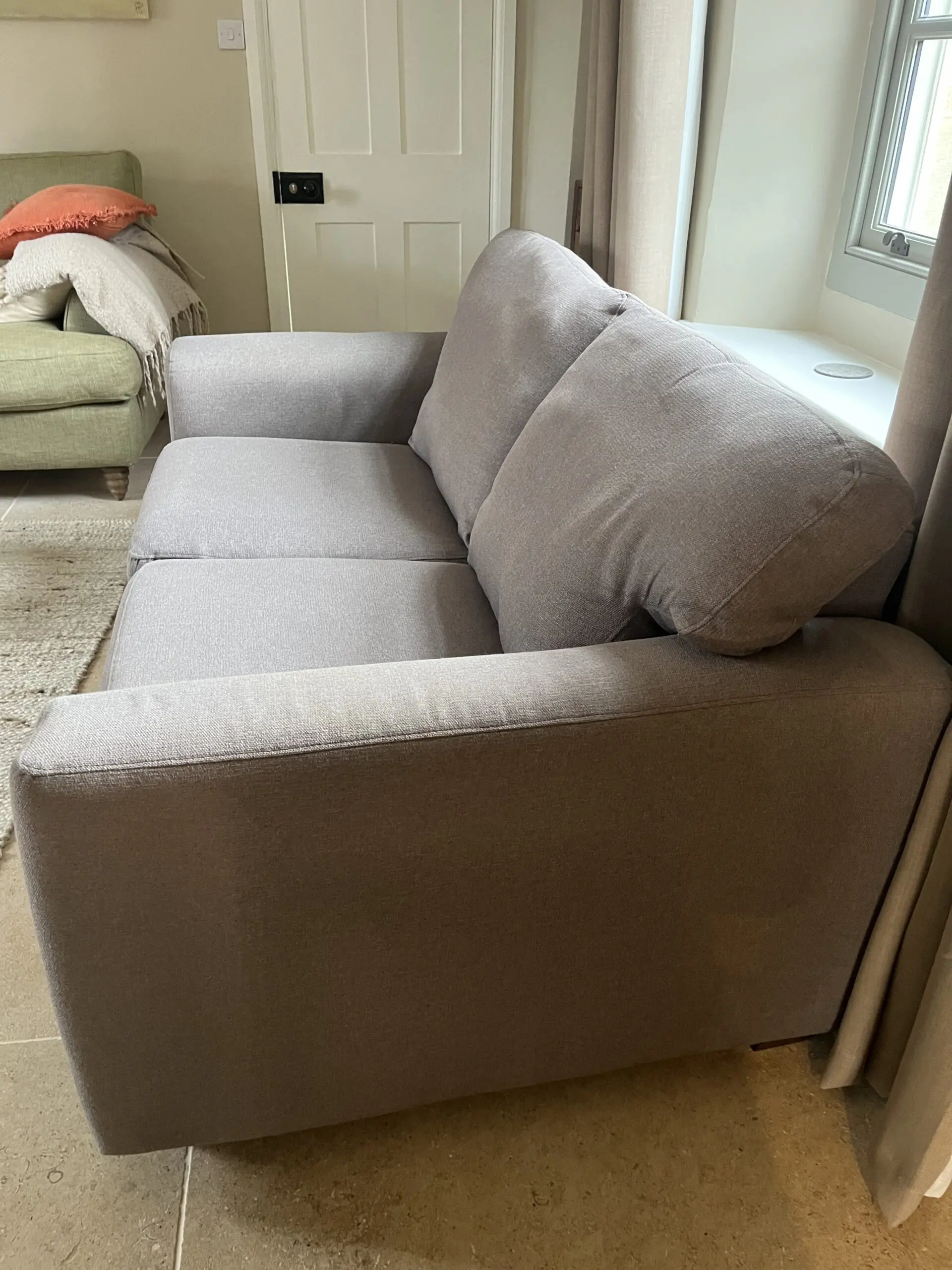 Grey two seater Heals sofa