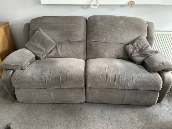 Two matching sofa (one with automatic recliners)