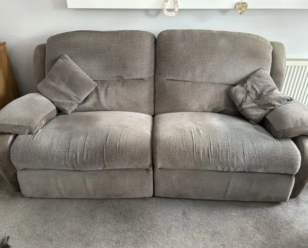 Two matching sofa (one with automatic recliners)