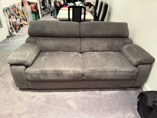 3 x seater sofa (one sofa bed) and footstall