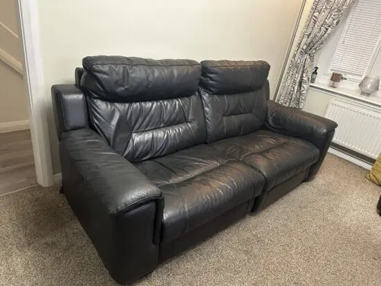 DFS Black reclining sofa + chair and footstool