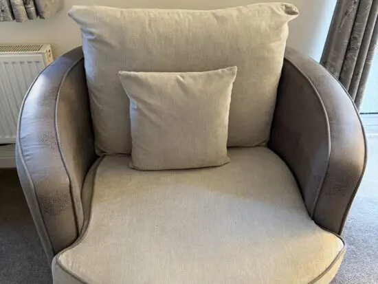 Grey & brown swivel cuddle chair