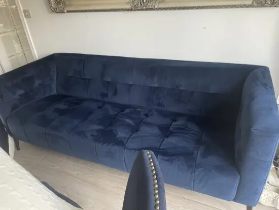 Navy blue velvet sofa