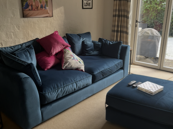 Velvet blue sofa from baker and stone house