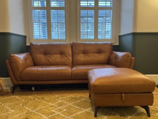 3 seater tan Harlan DFS sofa and storage footstool