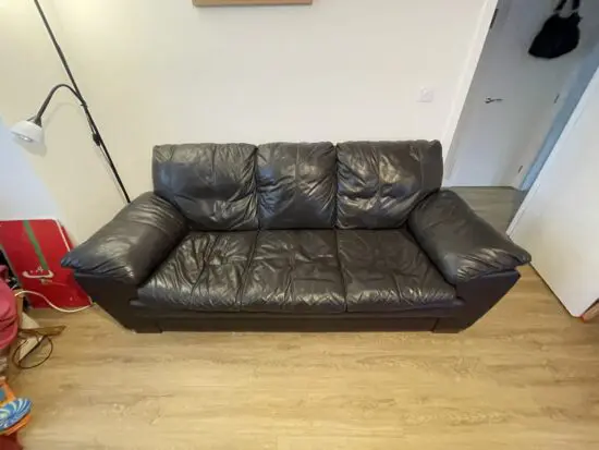 Brown leather DFS three seater sofa