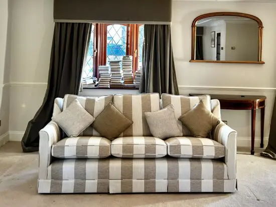 As new 2 Multi York striped 3-seater sofas with cushions