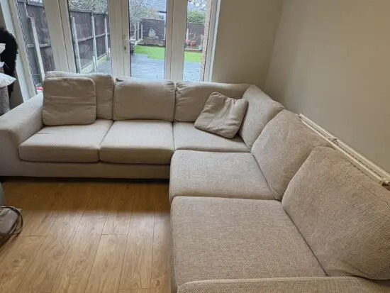 BRAND NEW Corner Fabric Comfy Sofa - as good as new stored in an annexe building