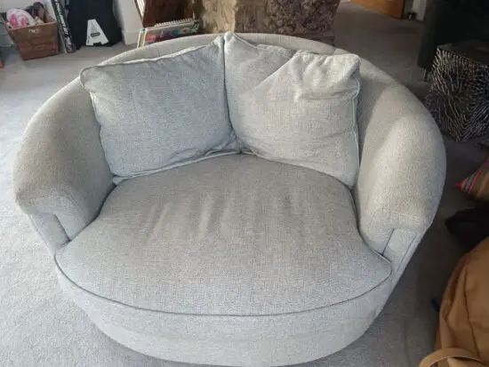 Grey snuggle swivel sofa