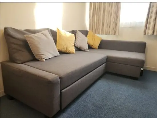 Ikea Grey Corner Sofa Bed with Storage and Bed Topper