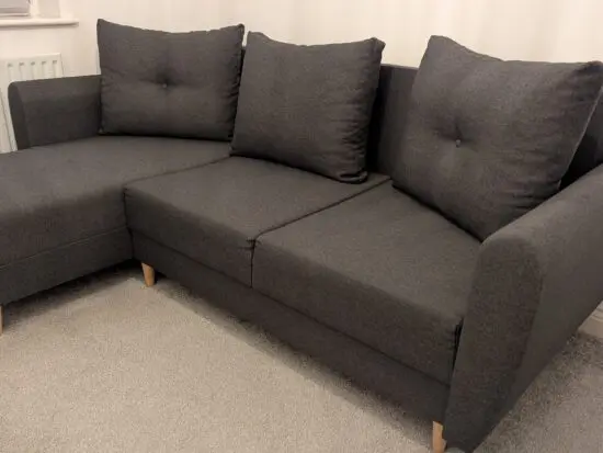 Grey melange corner sofa bed