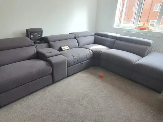 Corner sofa with recliner and reading lights