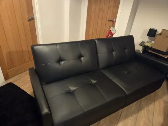 3 seater black leather sofa bed