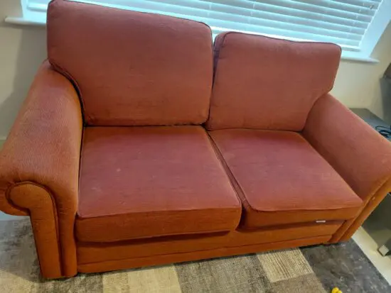 Maroon 2 seater sofa