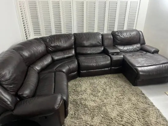 Dark brown leather sofa with chaise and recliner