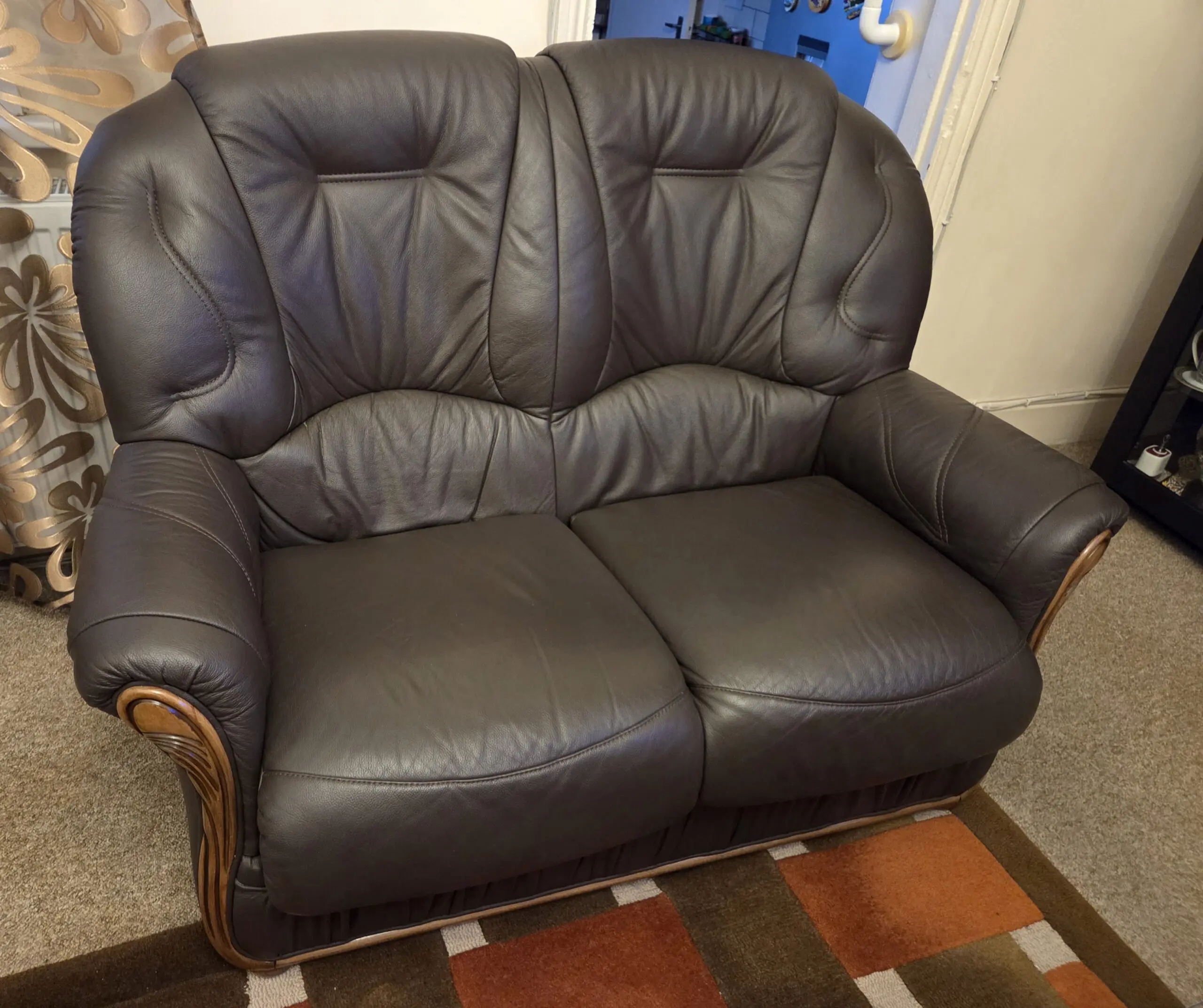 Comfortable 2-Seater Sofa with Wooden Trim Details