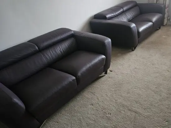 2 x two seater Furniture Village leather settees