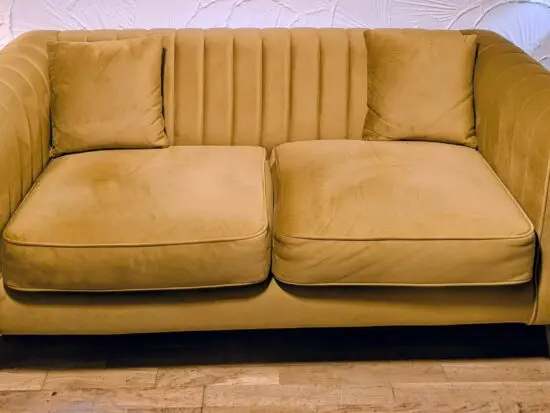 Gold 2 seater couch.