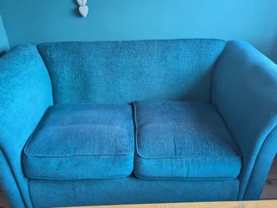 2 x two seater teal sofas