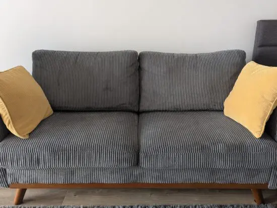 Comfortable 2 seater sofa, Gray, like new.