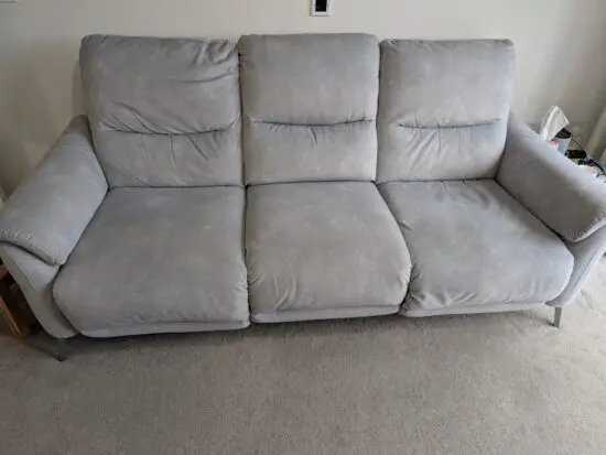 Furniture village 3 seater recliner sofa in light grey