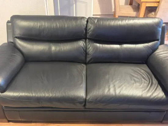 DFS black leather 3 seater sofa and reclining chair