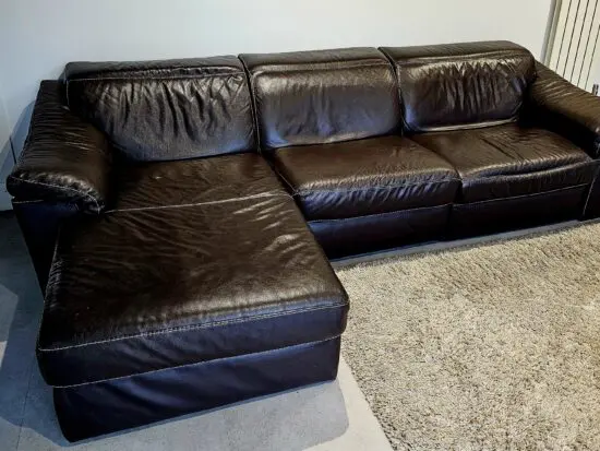 Natuzzi Brown leather corner sofa with power recliners