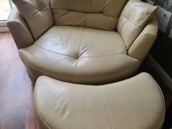 D.F.S. selling luxurious Italian leather swivel sofa & footstool