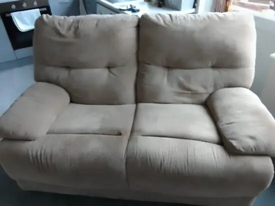 Beige 2 seater sofa