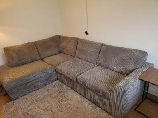 DFS Errico right-hand facing arm open end corner sofa in charcoal cord