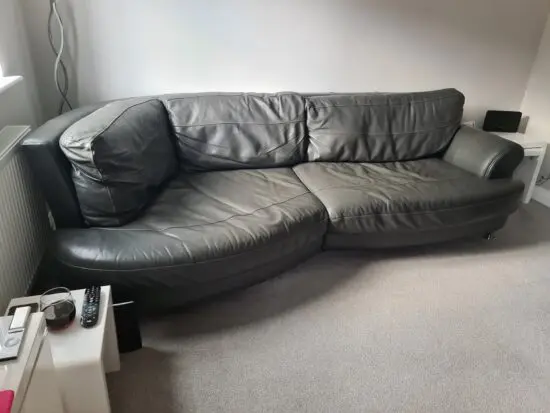 Grey leather sofa and hug chair