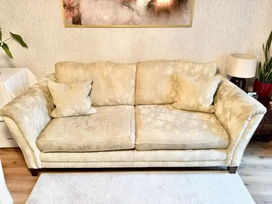 Three seater cream sofa from Furniture Village