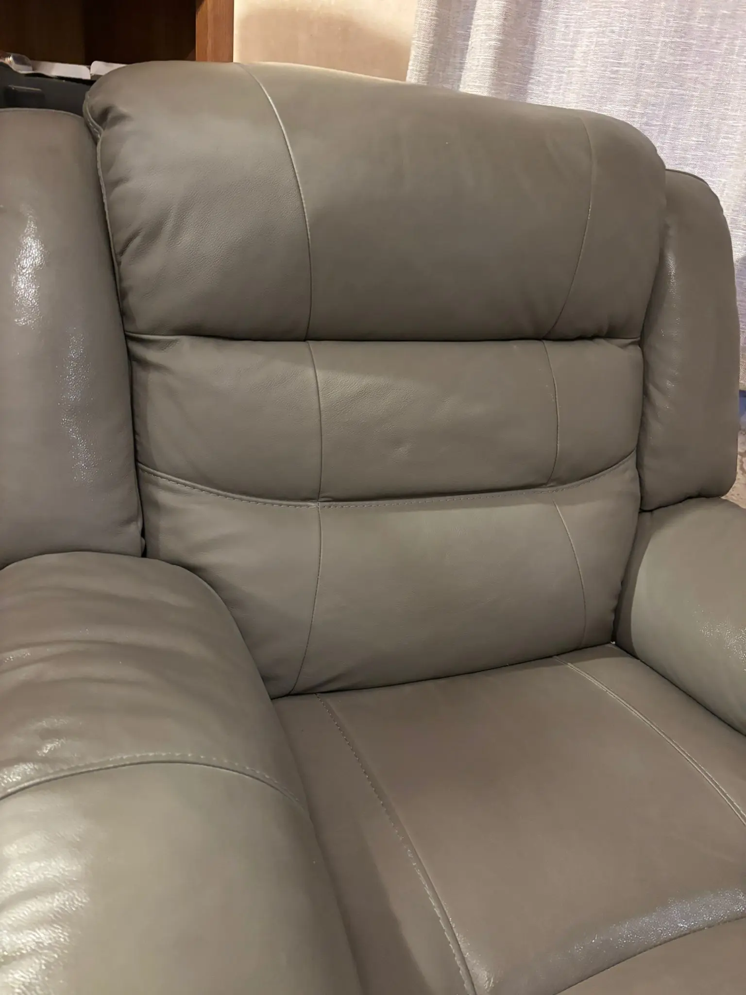 Grey leather sofa and armchair