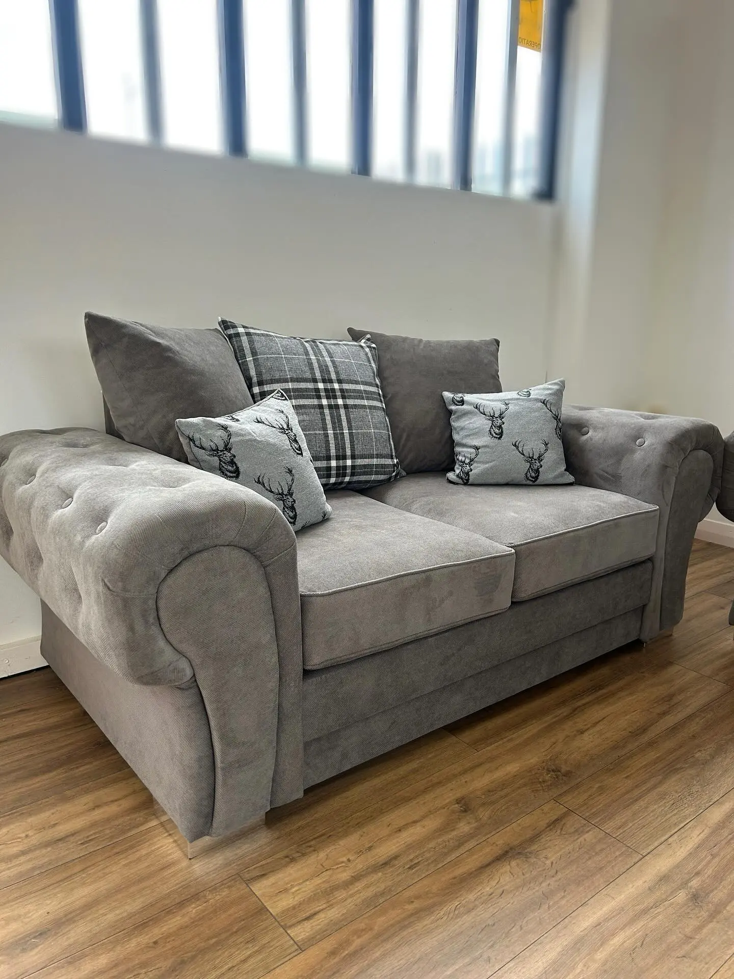 DFS Stylish 2-Seater Sofa with Rolled Arms and Button Details