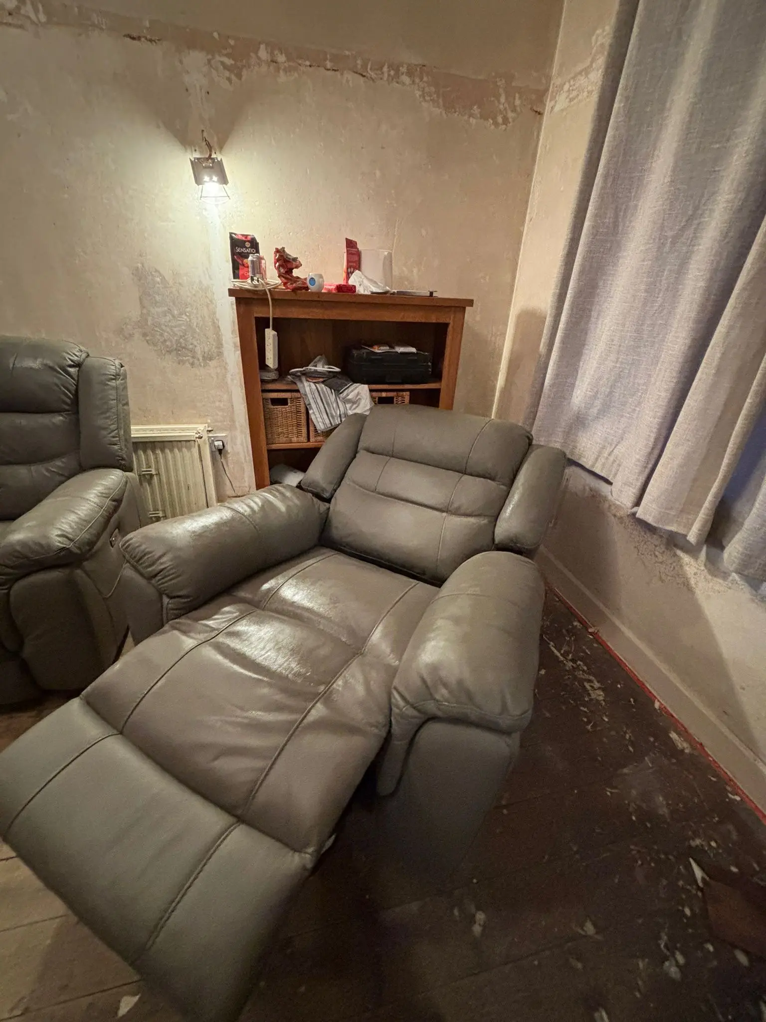 Grey leather sofa and armchair