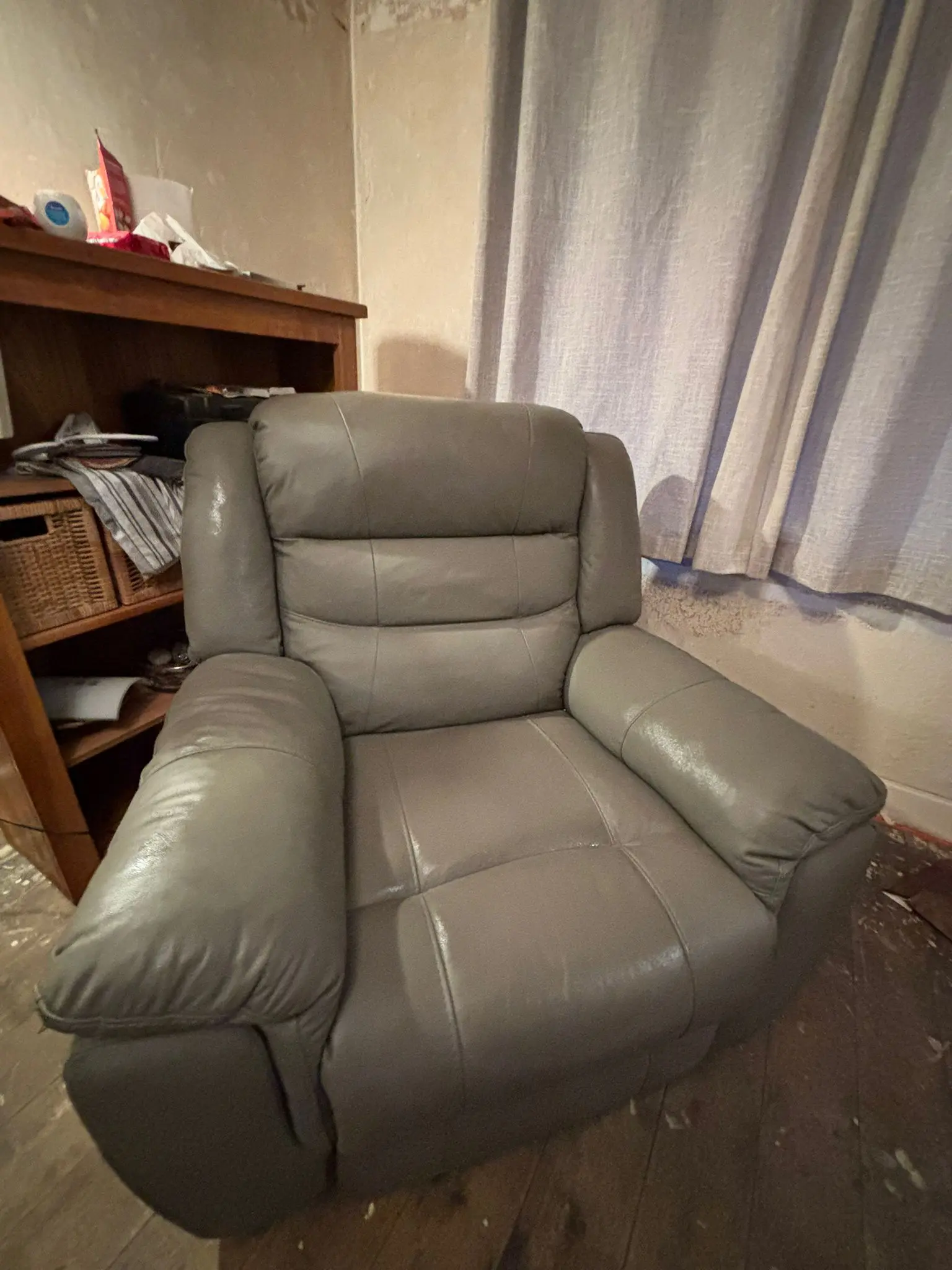 Grey leather sofa and armchair