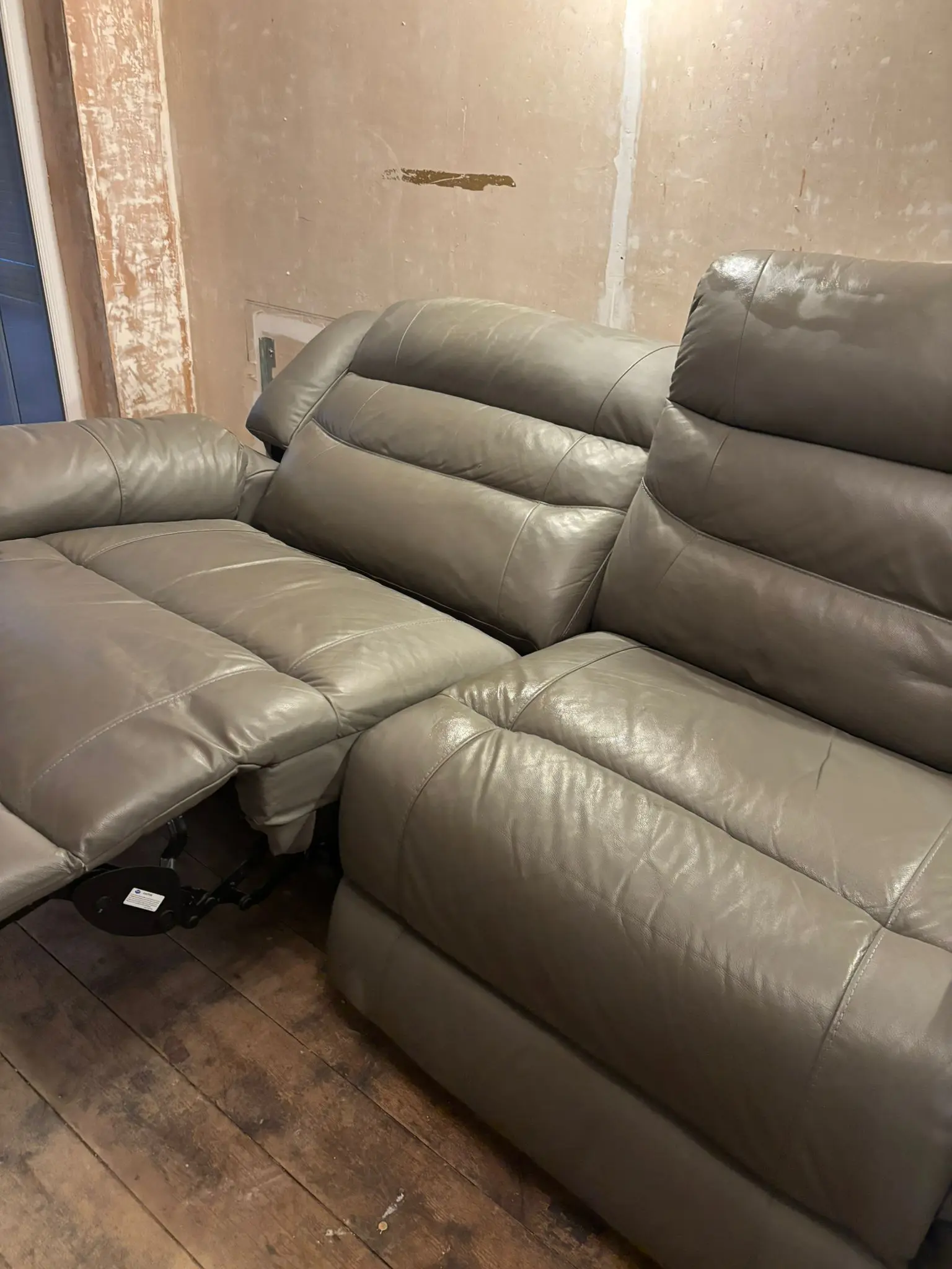 Grey leather sofa and armchair