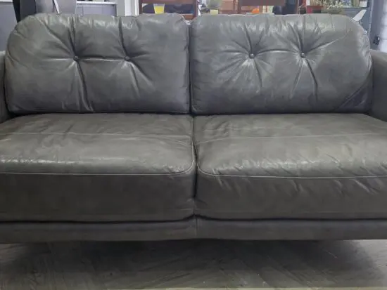 John Lewis Home "Arlo", Medium 2 Seater, Leather Sofa in "Milan Taupe" (brown) with light wood legs.