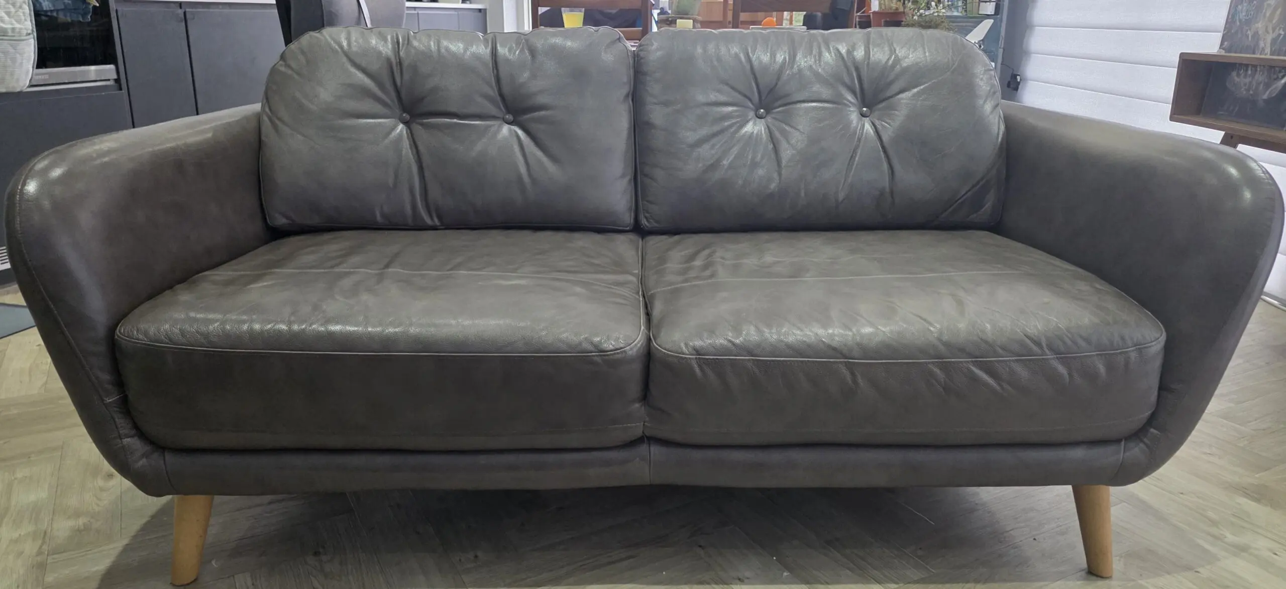 John Lewis Home "Arlo", Medium 2 Seater, Leather Sofa in "Milan Taupe" (brown) with light wood legs.