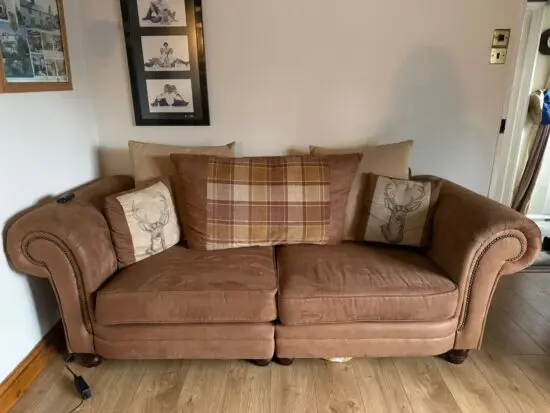 SCS brown fabric sofas.