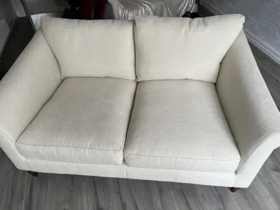 John Lewis 2 seater cream sofa