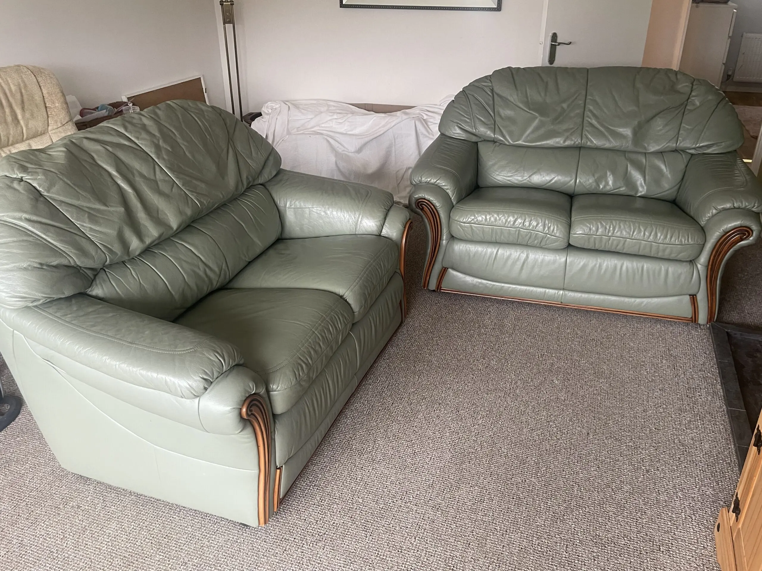 Two – 2 seater leather sofas