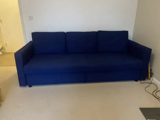 3 seater navy sofa able to fold to double sofa bed with storage under seats