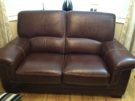 World Of Furniture brown real leather sofa.
