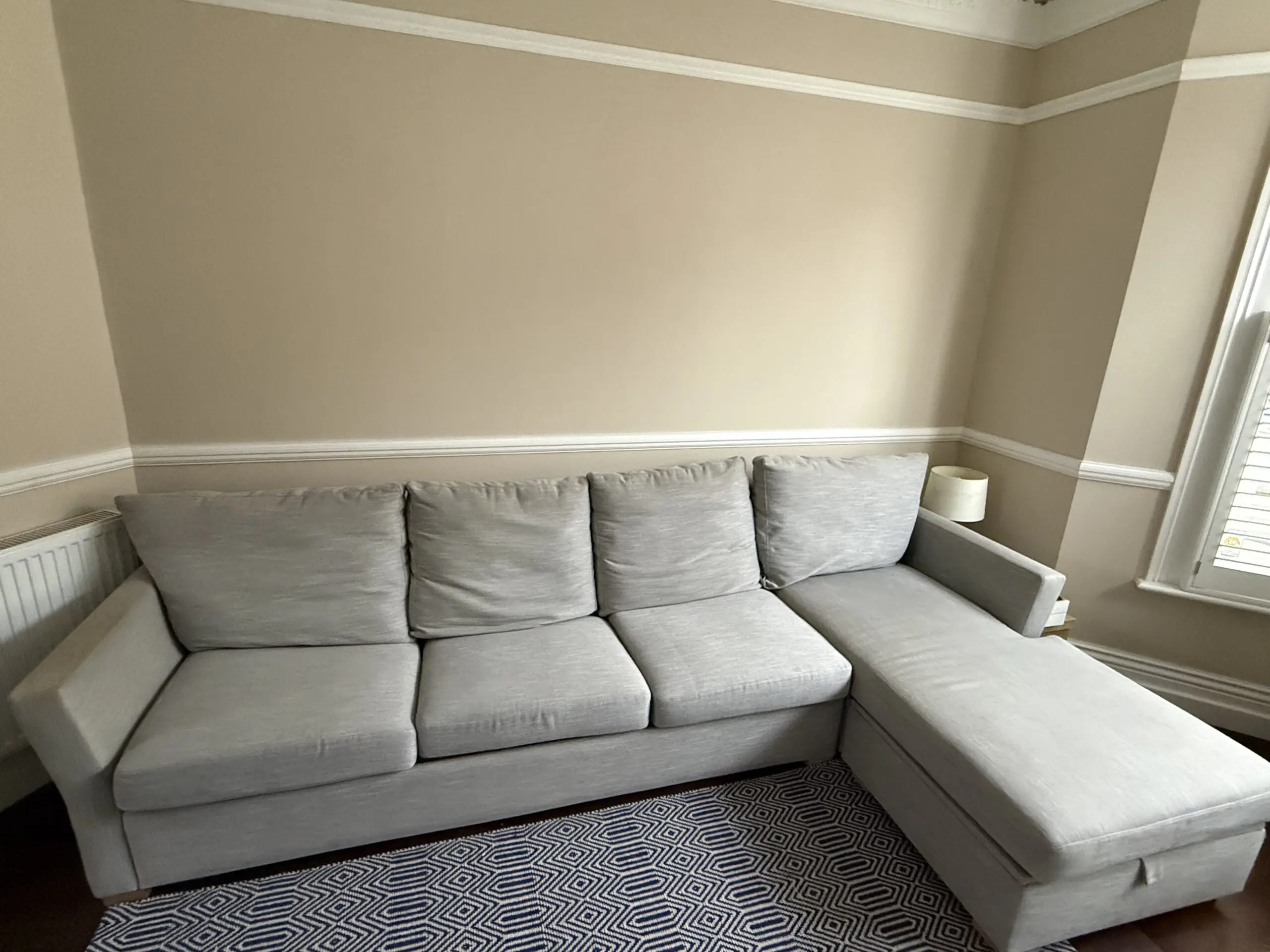 4-seater left hand corner sofa with integrated sofa bed and storage chest