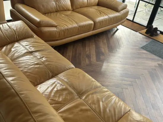 Harvey’s yellow leather sofas