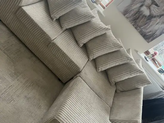 Beige ribbed L shape sofa